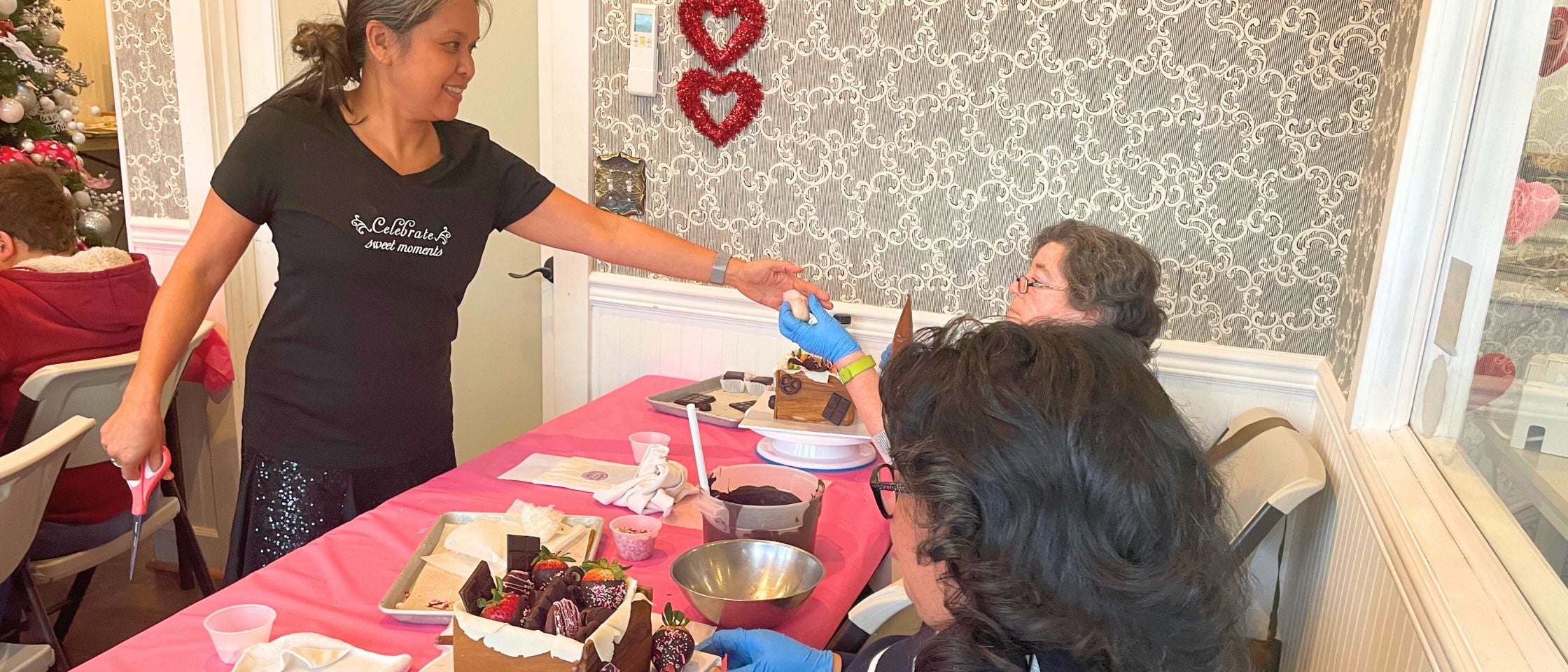 three women making chocolate cake