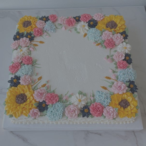 Sheet cake decorated with colorful flowers