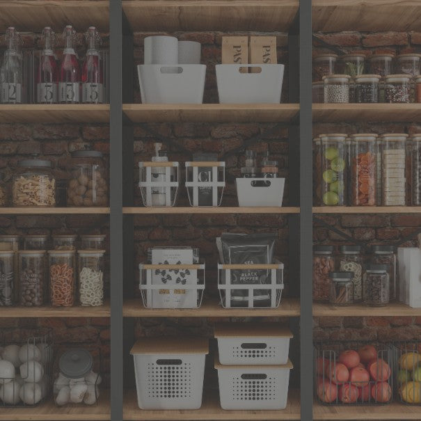 Wooden shelves with jars, containers, and baskets in a kitchen setting