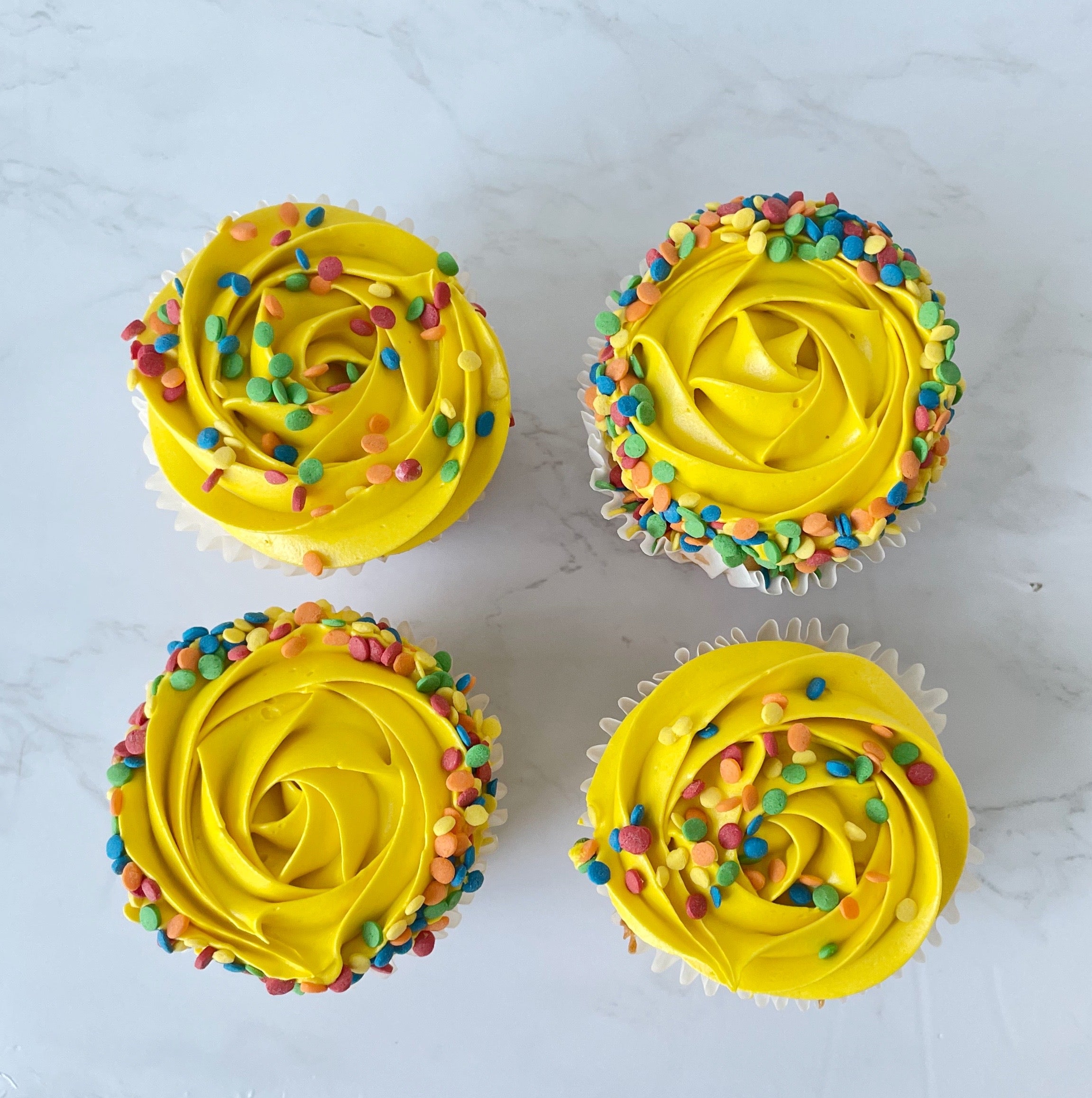 Sprinkle Drip Celebration Cupcakes (per dozen)