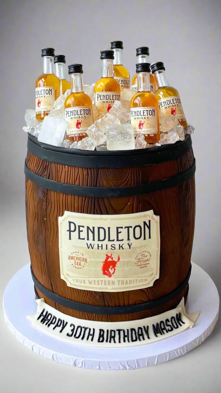 Candle jar cake – Cake designed to look like a glass candle jar with whipped cream topping and label detail