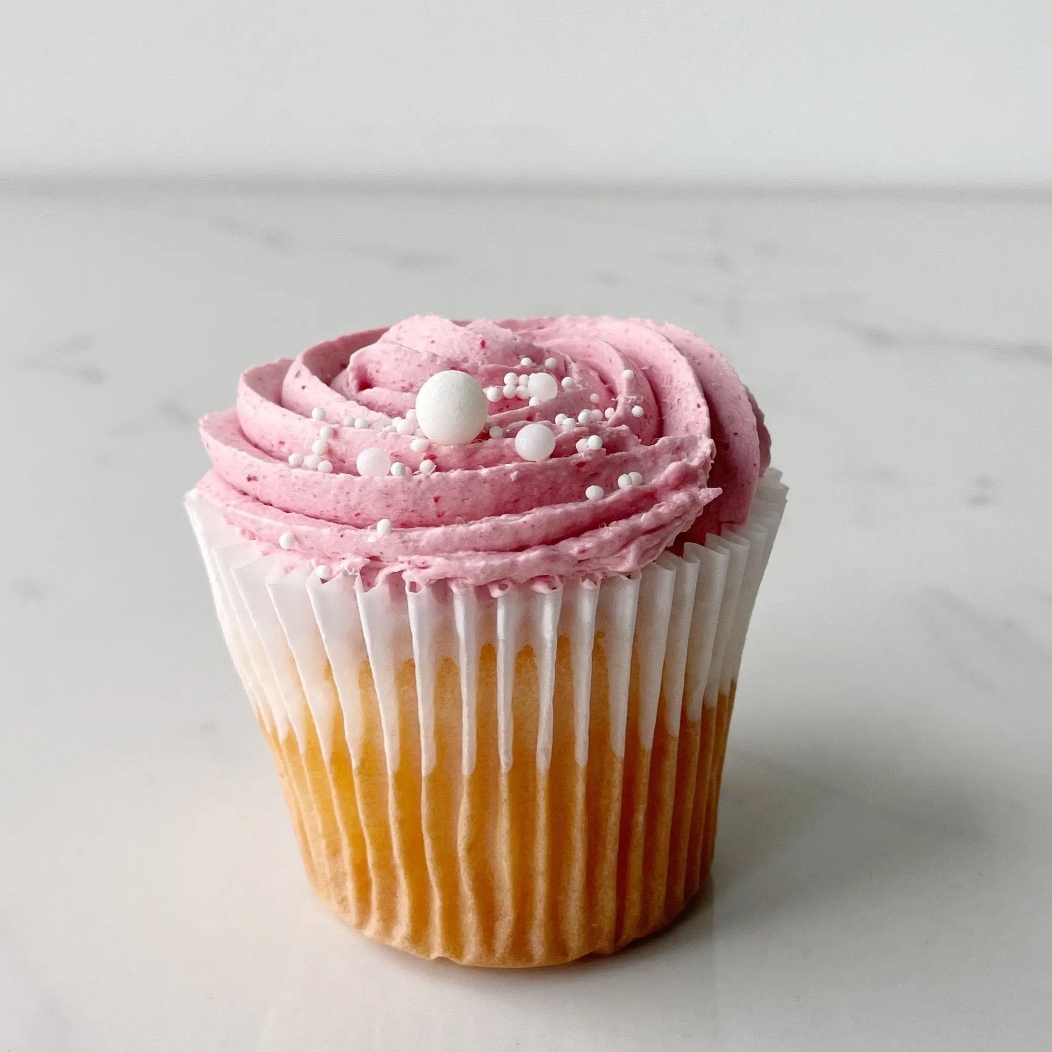 Pink Champagne Cupcake - Celebrity Cake Studio