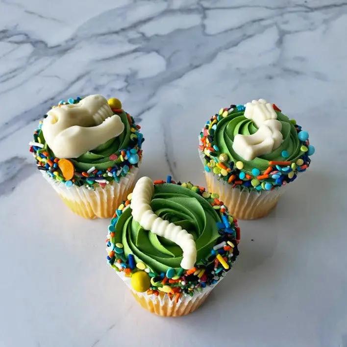 Dinosaur Cupcakes, Cupcakes, Desserts, Sweets, Birthday Treats, Celebration Treats, 5 Flavors, Chocolate Cupcakes, Vanilla Cupcakes, Carrot Cupcakes, Lemon Cupcakes, Pink Champagne Cupcakes