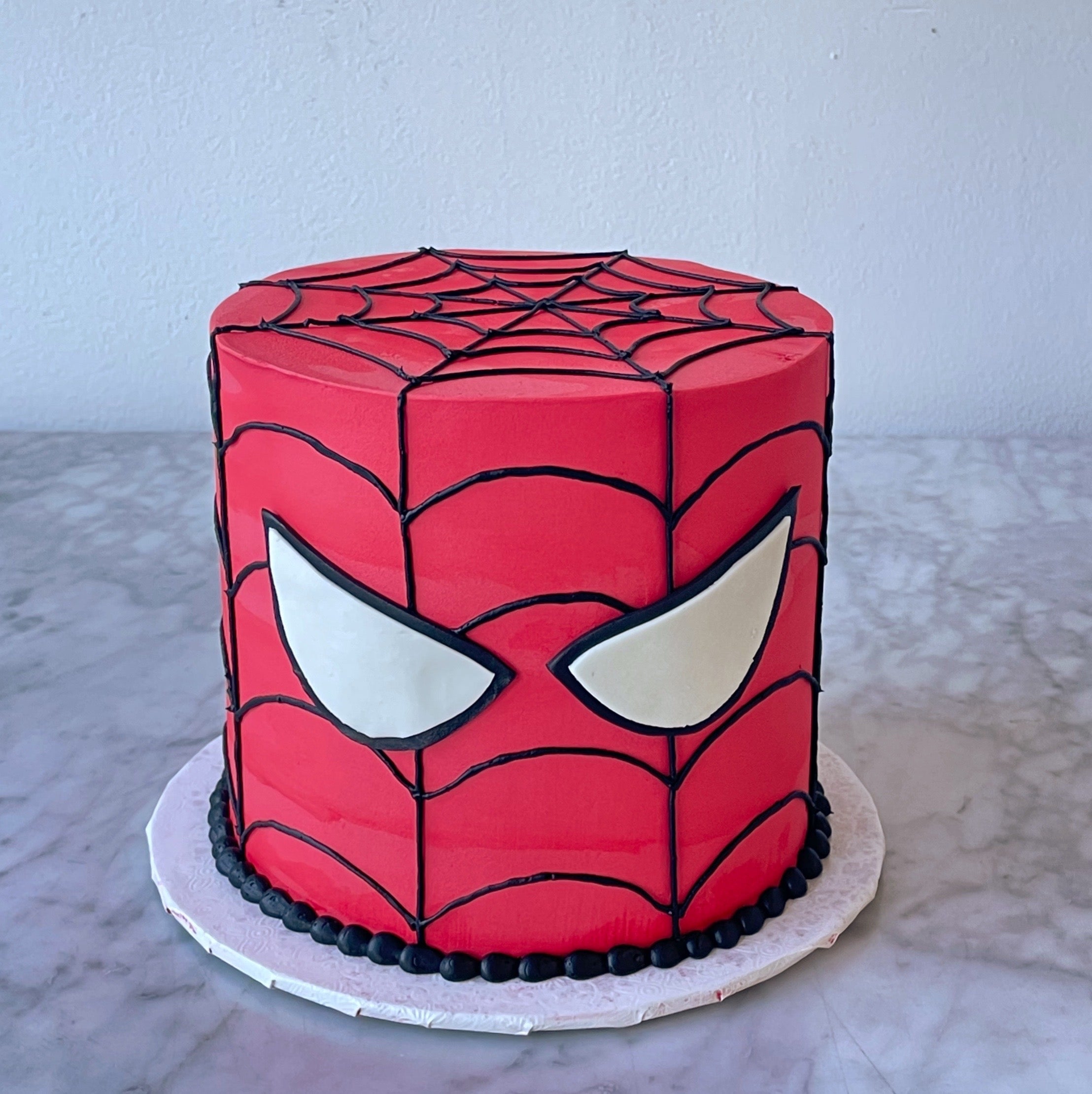 Spiderweb Mask Cake