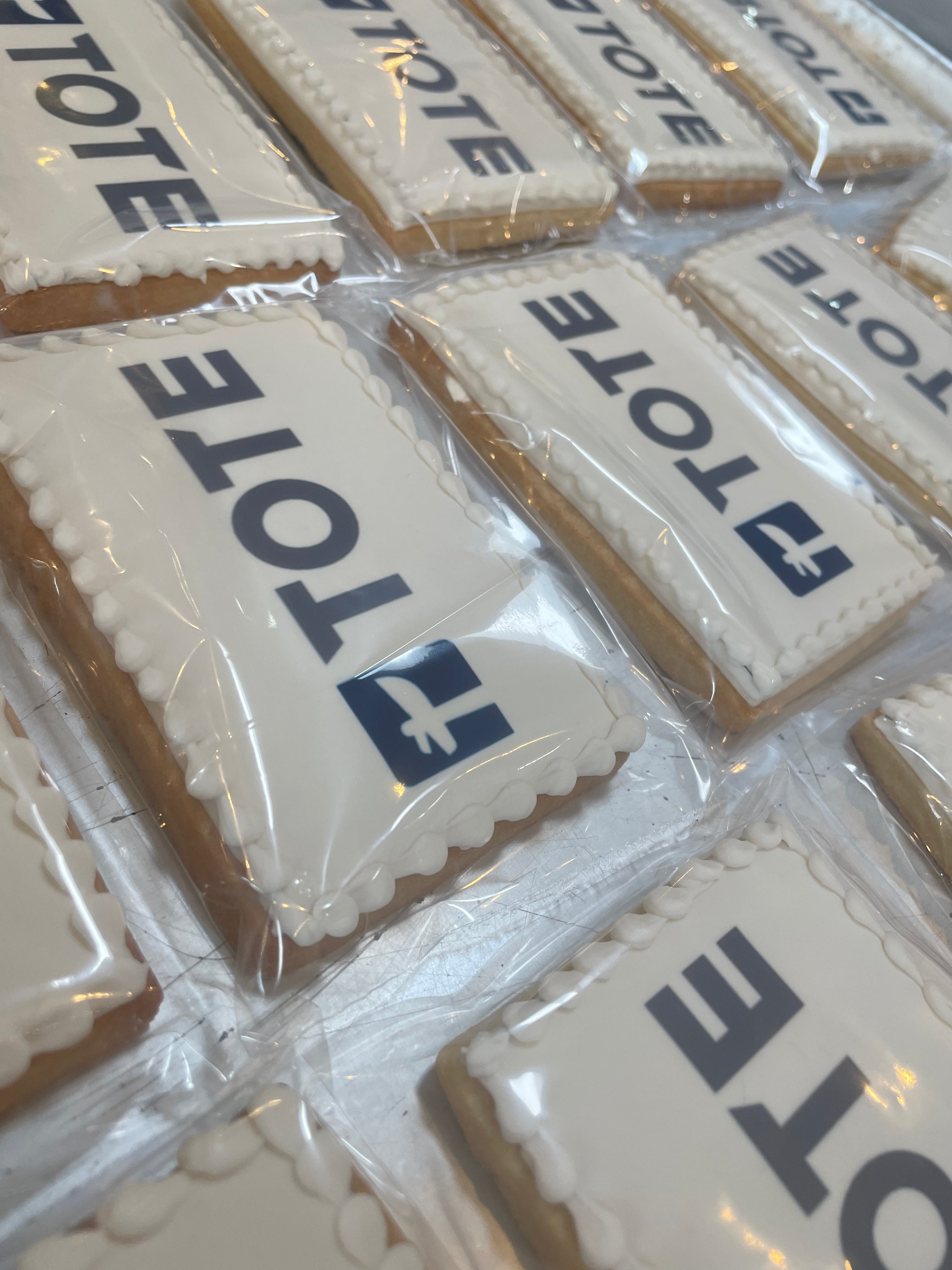 Cookies with 'TOTE' branding in clear packaging