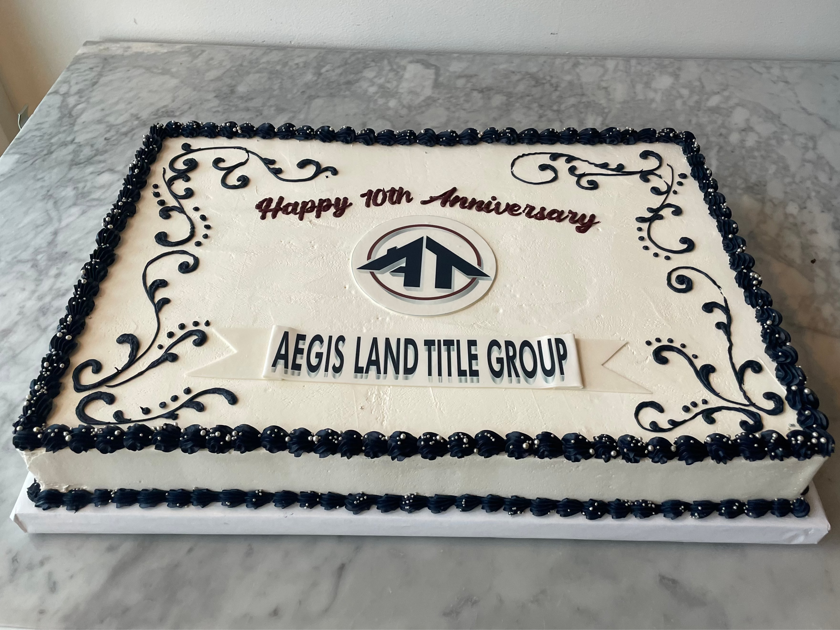 Anniversary cake for Aegis Land Title Group