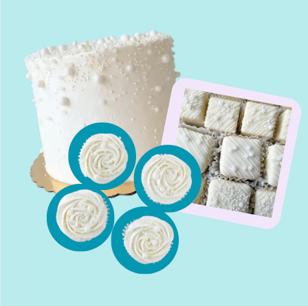 A collection of Bakery items including a cake with dragees, cupcakes, and petit fours. The cake has white frosting and the cupcakes have decorative sprinkles.
