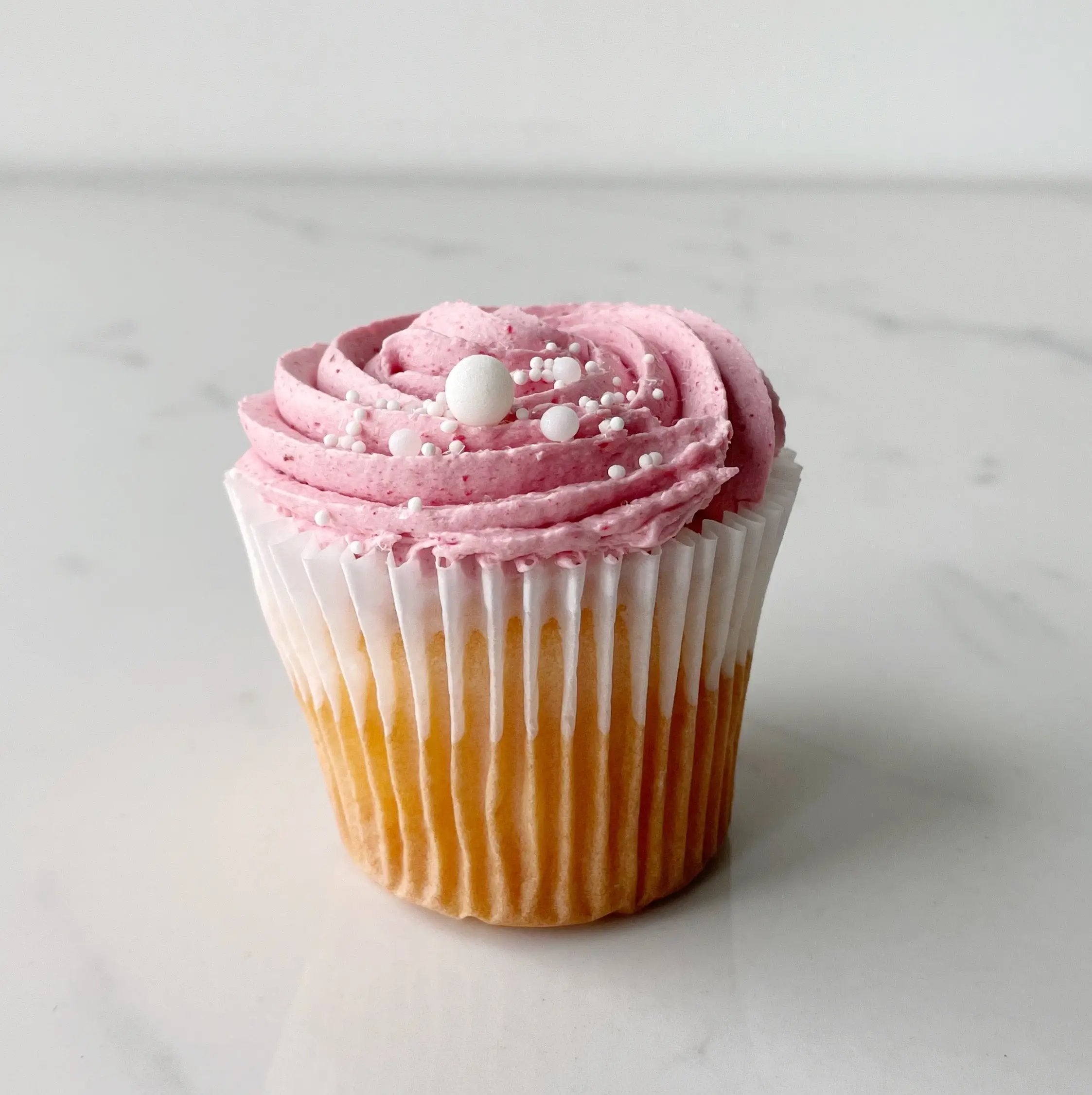 Pink Champagne Cupcake - Celebrity Cake Studio