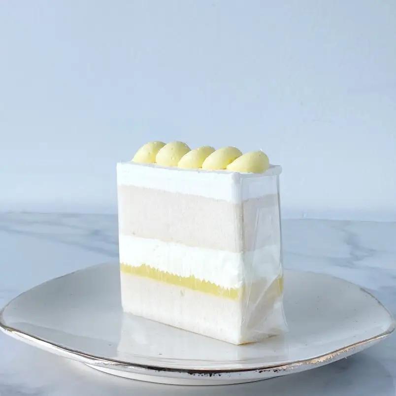 White Cake Slice with Lemon Mousse and Lemon Preserve